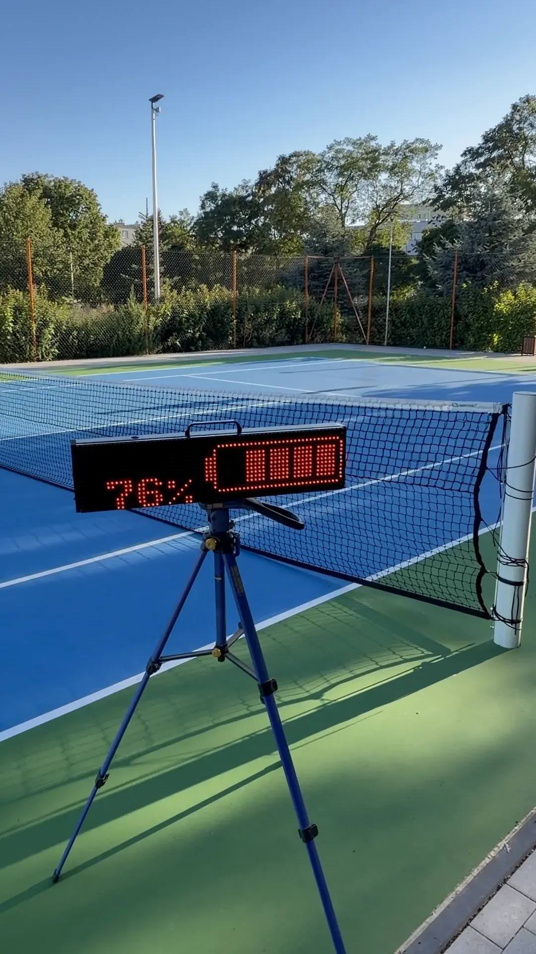 ScreenBattle scoreboard on court displaying 76 percent battery status